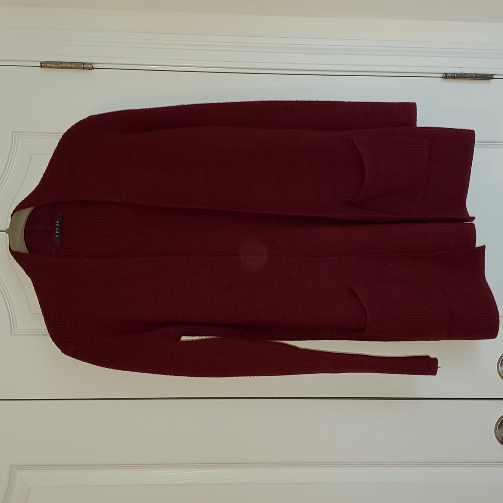 Cyrus Women's long sleeve cardigan sweater.